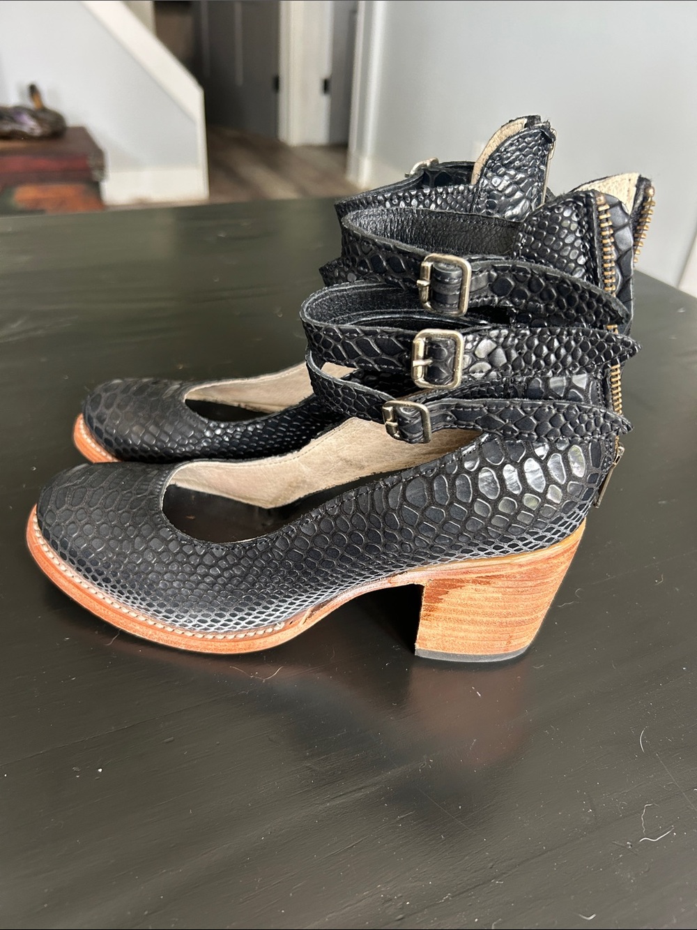 freebird Black Textured Leather Ankle-Strap Booties with Wood-Tone Heel